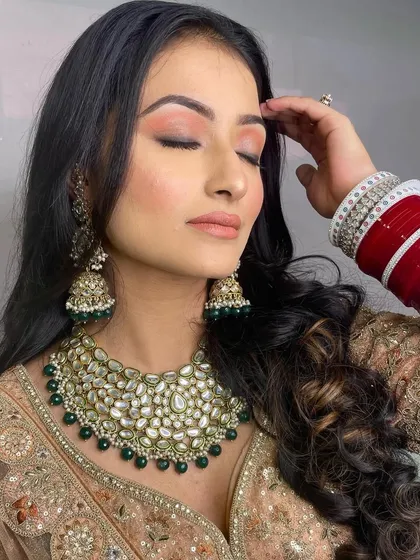 The closed-eye shot allows a clear view of the simple yet elegant eye makeup. Sometimes, less is more, and you will learn the art of subtlety.