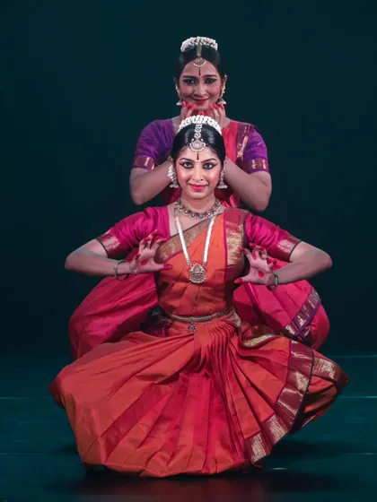 A perfectly symmetrical pose in a duet with Apeksha. Such moments of stillness are just as powerful as the movements, creating beautiful stage pictures.