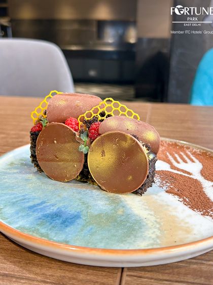 The creative plating of our chocolate dessert, designed to be as much a feast for the eyes as for the palate.