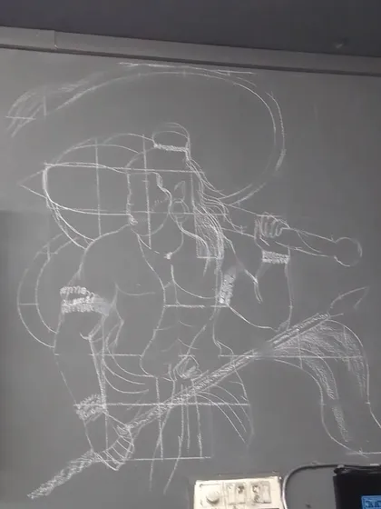 Before I start painting any mural, I create a detailed grid sketch directly on the wall. This is a crucial step in my process that ensures all the proportions are accurate and the final artwork is clean and professional.