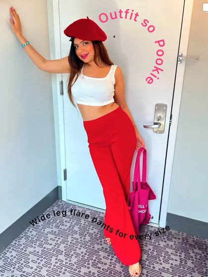 The full 'pookie' outfit, complete with a red beret. This look is all about having fun with fashion.
