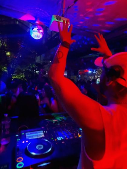 Reaching for the lasers. I interact with every element of the production to create a dynamic show.