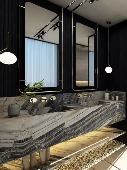 The master bathroom is treated as a sanctuary. In this design, dramatic Panda White marble with bold veining forms the dual vanity, contrasted with dark wood walls and minimalist brass fixtures to create a space of sophisticated and luxurious calm.