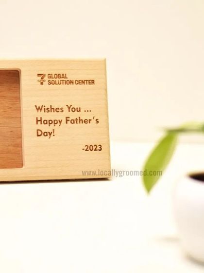A thoughtful gift for Father's Day. This custom wooden photo frame was created for the Global Solution Center to give to their employees.