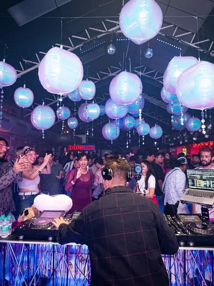 From behind the decks during a packed night. You can see the crowd is right there with me, feeling the music. It's this connection that makes a gig special.