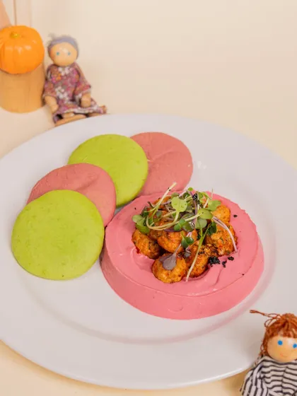 Another look at our colorful and healthy pita with beet hummus. We believe in offering food that is both fun to eat and good for our little guests.