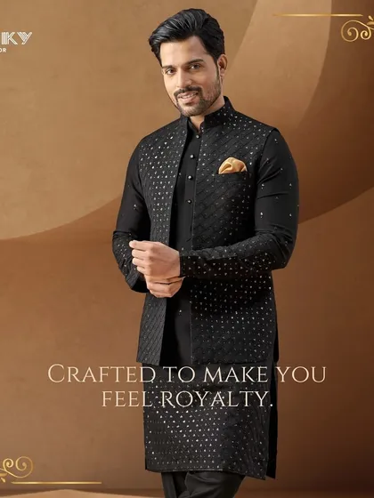Crafted to make you feel royalty. This Diwali campaign image features a stunning black-on-black embroidered kurta and jacket set.