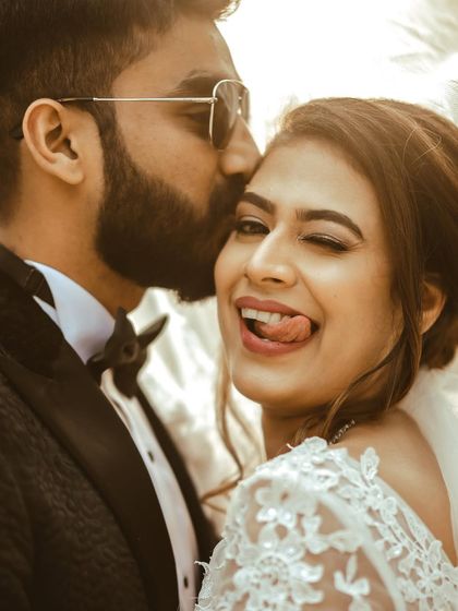 A fun, playful close-up of the couple, capturing the bride's personality perfectly.