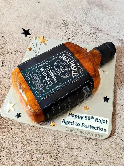 Is it a bottle or is it a cake? This realistic Jack Daniel's bottle was carved entirely from cake to celebrate a special 50th birthday. It’s a great example of how we can turn almost any idea into a delicious, edible centerpiece.