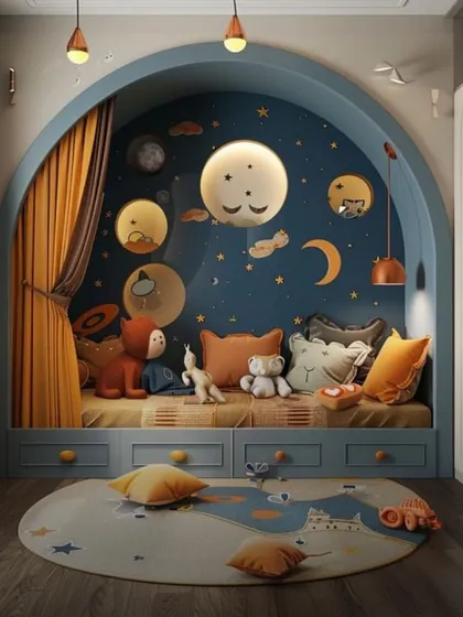 A cozy reading nook built into an arched alcove with a celestial theme. This design provides a comfortable spot for bedtime stories, complete with whimsical lighting and storage drawers.