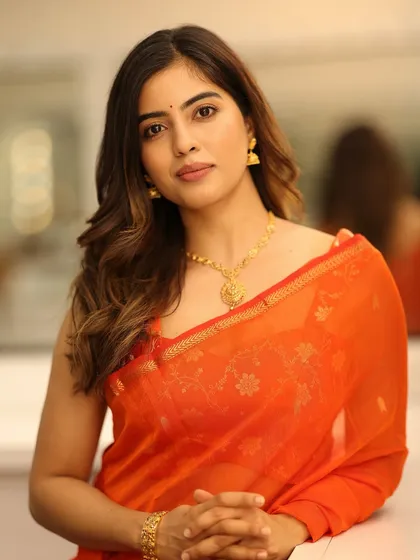 A beautiful portrait of actress Amritha Aiyer. I created a soft, natural makeup look to complement her vibrant orange saree.