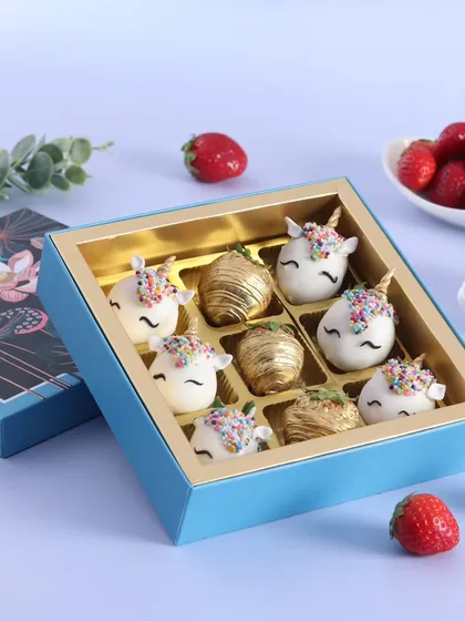 How cute are these Unicorn Strawberries? Fresh strawberries dipped in white chocolate and decorated to look like magical unicorns, a whimsical winter treat.