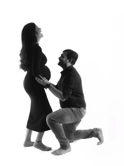 A moment of pure laughter and joy, captured in a timeless black and white silhouette. This shows that even artistic shots can be full of fun and personality.