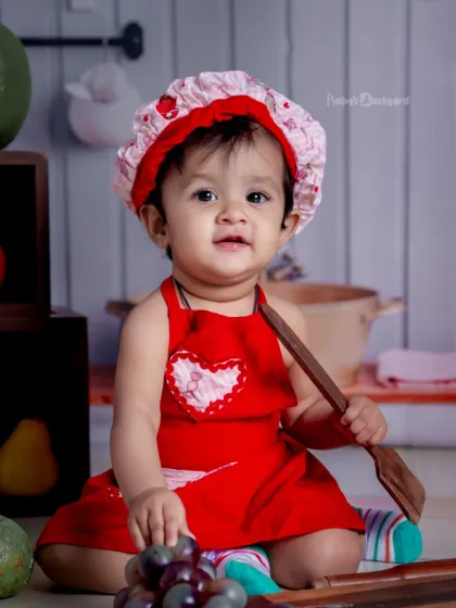 Whipping up some love and a sprinkle of smiles. This little baker is the cutest in the kitchen.