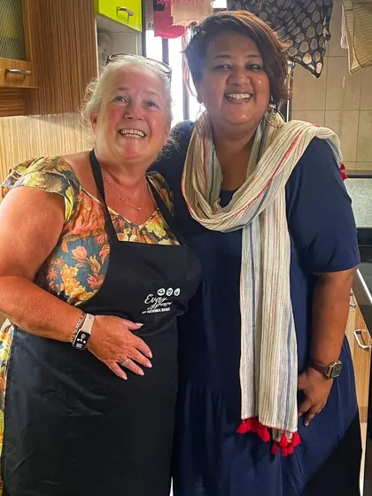 A happy guest and a new friend after a successful cooking session. It's moments like these that make my work so fulfilling.