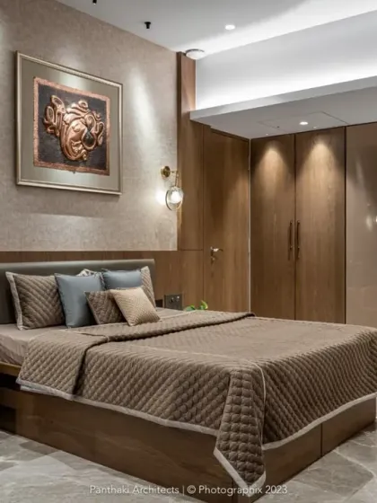 A bedroom where lighting plays a key role. Spotlights highlight the custom wardrobes and artwork, while softer ambient light creates a relaxing atmosphere perfect for unwinding at the end of the day.