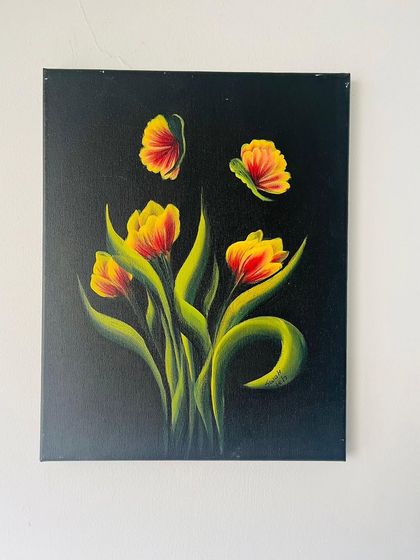 Another example of one-stroke tulips on a dark background. This technique is versatile and can be used to create many different types of flowers and leaves.
