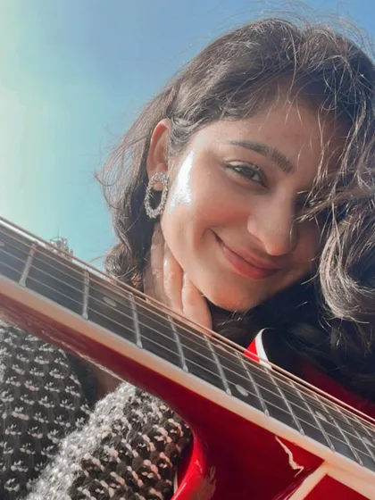 Just me and my guitar on a beautiful sunny day. This is my happy place, ready to bring some musical sunshine to your event.