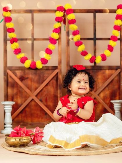 A big, happy smile from our traditional themed session. I love when parents want to incorporate their culture into their child's portraits.