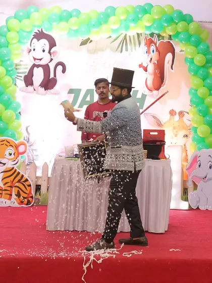 Creating a magical snowstorm on stage. This effect adds a beautiful, theatrical touch to the finale of my birthday magic show.