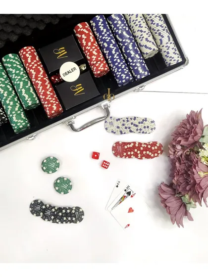 Make your game nights personal with our custom poker set. This image shows the complete set, including personalized chips, cards, and a dealer button, all in a sleek case.