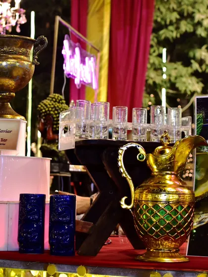 A glimpse of my 'Alcoholic Caviar' station. This setup features elegant glassware and props, designed to showcase my molecular mixology offerings in a sophisticated way.