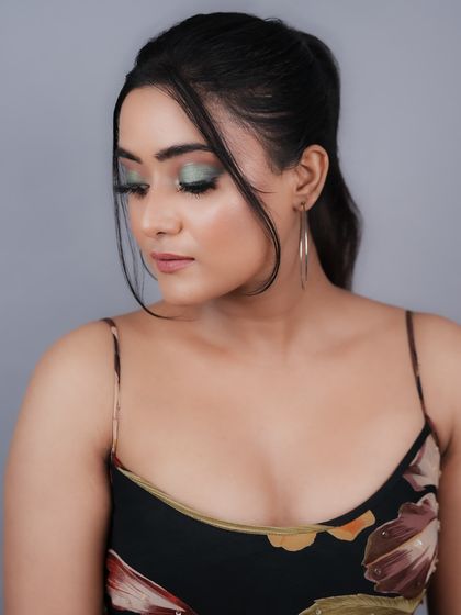 This soft green and gold glam look demonstrates the versatility my students develop. They can create both bold and subtle looks with equal skill.