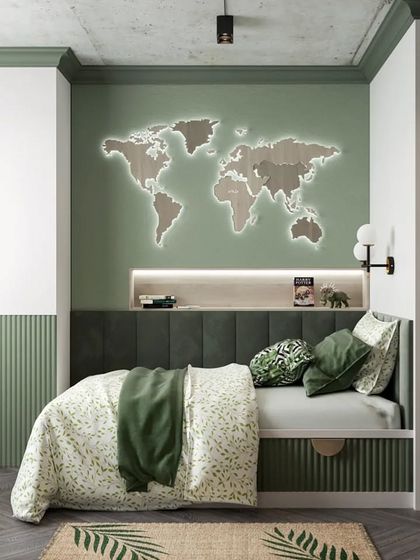 This travel-themed kid's bedroom features a large wooden world map with backlighting as a headboard. The green and wood tones create a natural and adventurous feel.