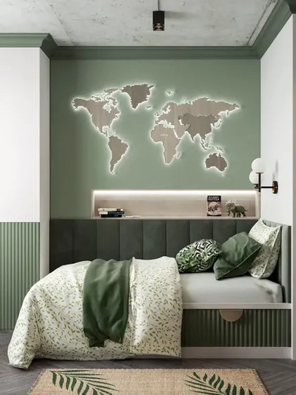 This travel-themed kid's bedroom features a large wooden world map with backlighting as a headboard. The green and wood tones create a natural and adventurous feel.
