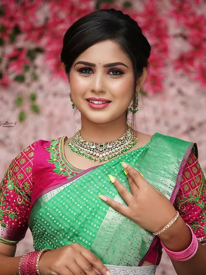 A makeup look I demonstrated during one of my professional makeup courses. This shows a modern party look with bold pink and green tones.
