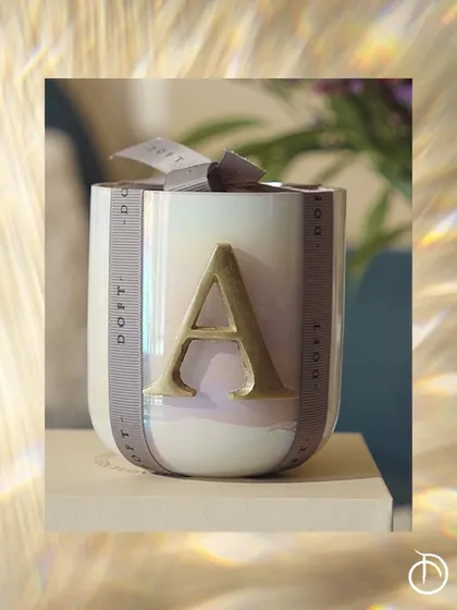 Every moment deserves a personal touch. My initial collection, featuring a bold metal monogram on an iridescent vessel, makes for a thoughtful and personalized gift for your loved ones.
