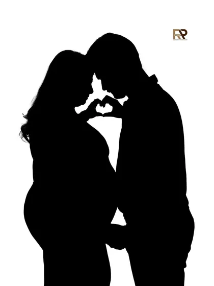 Silhouette portraits offer a timeless and artistic way to capture the beautiful shape of your pregnancy. Using dramatic lighting, we create these striking images that highlight the bond between you and your partner in a simple yet powerful way.