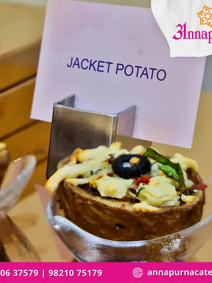 A close-up of our innovative Jacket Potato appetizer. It’s a classic comfort food reimagined as a bite-sized, flavour-packed starter for modern events.
