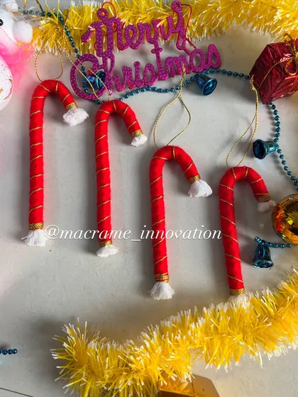My handmade macrame candy canes are a classic Christmas decoration. They look so cute hanging on a tree or as part of a gift wrapping.