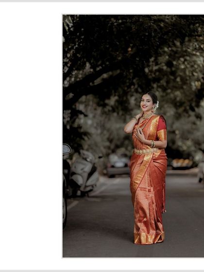 A classic three-quarter portrait of the bride on the street. Her happy, relaxed pose makes for a beautiful and natural shot.