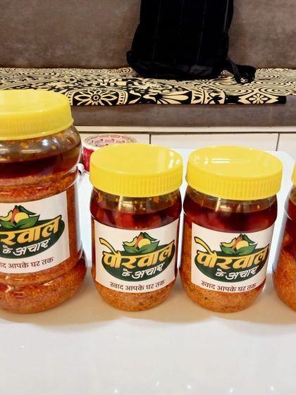 A fresh batch of my homemade pickles, packed and ready to be sent out. You can see the different sizes I offer, perfect for both small families and large gatherings.