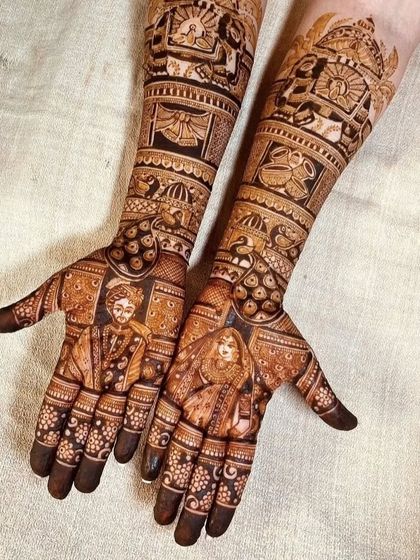 A beautiful portrait design of a bride and groom, with intricate details on their clothing and jewelry. The arms feature traditional motifs.