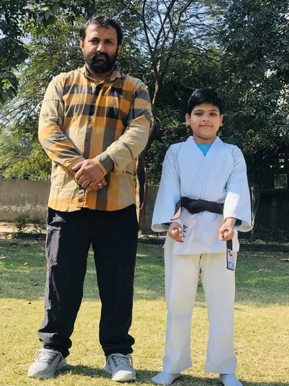 This student has earned his brown belt, the rank just before black belt. This is a result of years of consistent training.