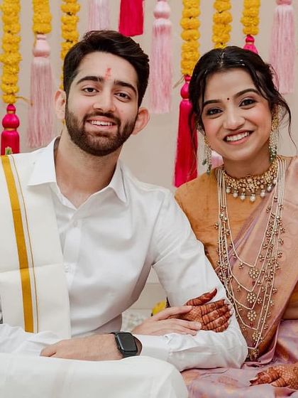 A beautiful South Indian bridal look for a wedding ritual. The makeup is simple and elegant, paired with a classic low bun and traditional temple jewelry.