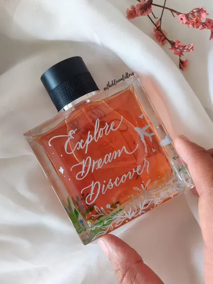 "Explore, Dream, Discover." I engraved this inspiring Mark Twain quote onto a Guerlain perfume bottle, surrounded by delicate hand painted illustrations, to create a gift that is both beautiful and meaningful.