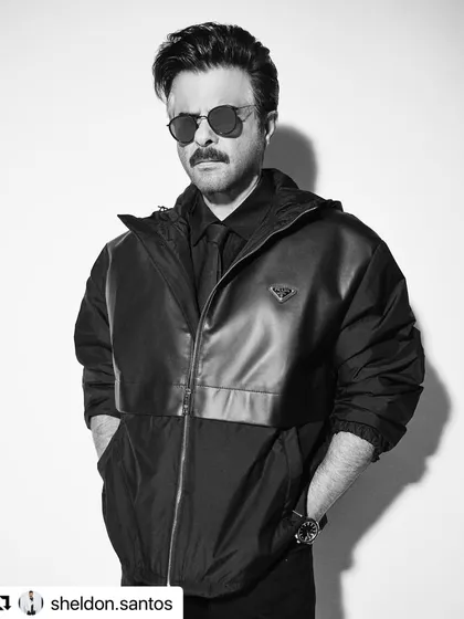 A sharp, high-contrast shot of Anil Kapoor. The clean lines of his haircut stand out even in monochrome.
