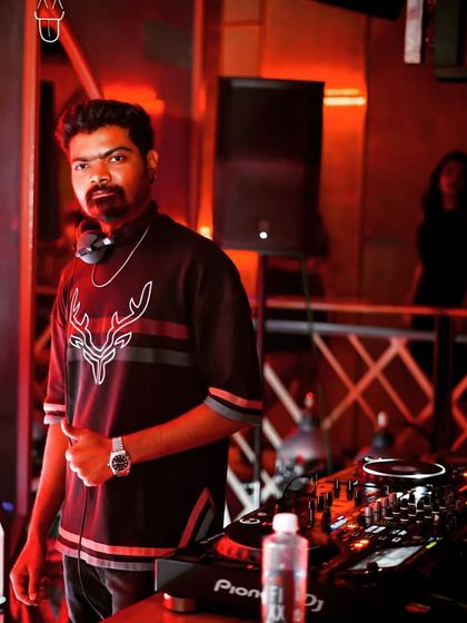 A look from the DJ booth at The Fixx Bar. The red lighting and industrial feel of the club create a great atmosphere for a high-energy set.