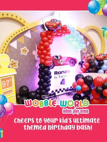 Another angle of the "Cars" themed birthday bash, showing the full balloon arch and race-themed decorations that create an immersive experience.