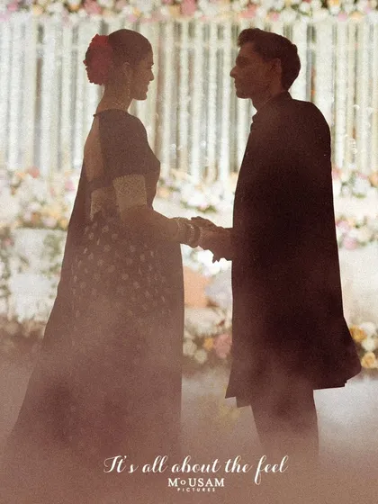 It's all about the feel. This single frame is the essence of what I strive to capture. Not just a picture of two people, but the atmosphere, the emotion, the unspoken connection between them. In the soft mist, with the world blurred around them, their story is the only thing that matters.
