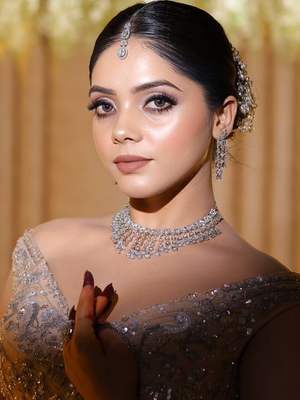 A beautiful portrait of the reception bride. The makeup is soft yet defined, perfect for photographs.