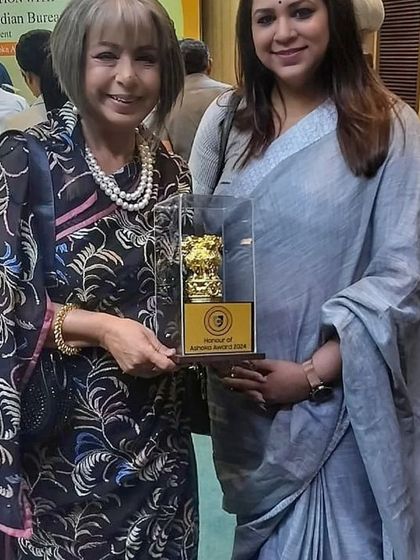 Presenting a memento at the Honour of Ashoka Awards. Recognizing the contributions of others is a key part of building a strong and supportive professional community.