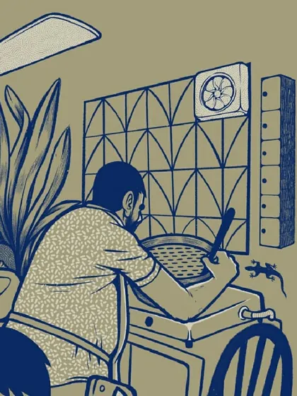This crop shows another family member working from home on a washing machine, a reality for many during the pandemic.
