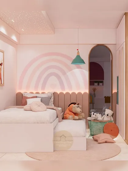 This adorable kids' room is designed for sharing, with two beds and a soft rainbow mural on the wall. The space is filled with playful details, like animal-themed art and a starry ceiling projection.