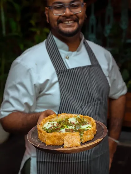 Chef Viveq presents one of his proud Puffizza creations, a perfect blend of comforting pastry and exciting flavors.