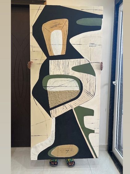 This 6ft x 3ft textured canvas was a fun experiment using unconventional materials like egg cartons for texture. It's a great example of how we can get creative to achieve a unique look for your space.